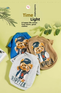 Detail view of cotton pet hoodies in blue, khaki, and grey with cool teddy bear prints