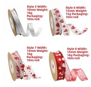 Detail view of heart-patterned ribbons in various colors for wedding gift wrapping