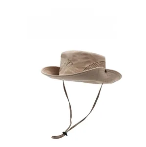 Detailed view of the breathable mesh side and mountain embroidery on khaki sun hat