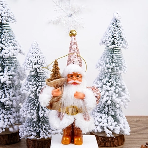 Detail of plush Santa Claus figure with gold sequins holding a small Christmas tree