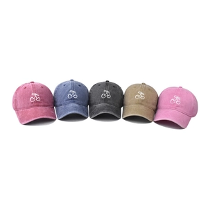 Washed cotton baseball caps with cherry embroidery in burgundy, blue, gray, and khaki