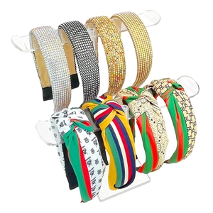 Clear acrylic double-tier headband display stand with eight various fashion hair bands