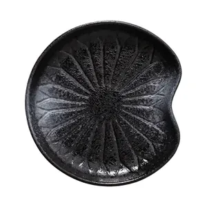 Japanese style black ceramic petal relief dessert plate with a unique matte lotus texture