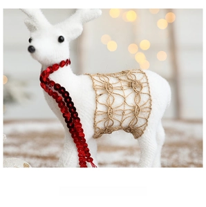 White reindeer Christmas ornament with red sequin scarf and hemp rope mesh detail