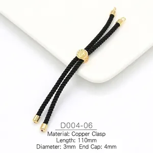 Detail of 3mm black braided cord with 18k gold plated tree motif bead and brass clasp