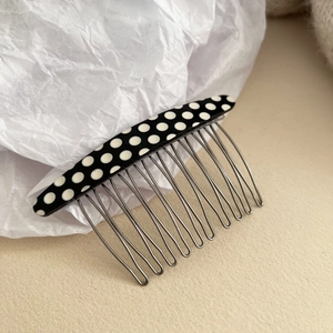 Polka dot acetate hair comb with eleven metal teeth for sleek fringe styling
