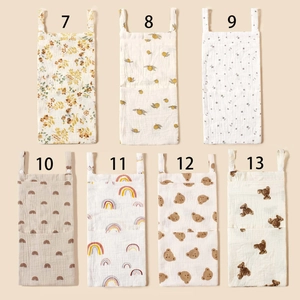 Cotton muslin crib hanging bag for baby diapers and toys in multiple floral patterns