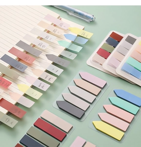 Macro shot of Morandi colored translucent sticky notes with assorted arrow and rectangle shapes