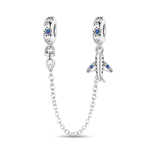 Detailed silver charm featuring a plane and starry night pendants with blue zircons