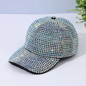 Close-up of sparkling hand-set rhinestones on a stylish black fashion baseball cap
