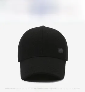 Front view of a thick wool baseball cap with a rectangle leather patch for winter