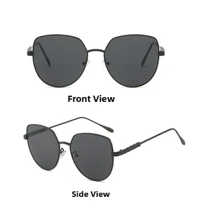 Detail view of black metal cat eye sunglasses with textured temples and silicone nose pads