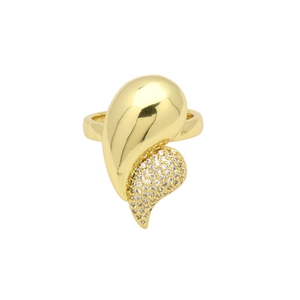 Detail of gold teardrop ring featuring polished metal and pave set white zircon stones