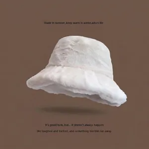 Detailed view of the soft white faux rabbit fur texture on this winter bucket hat