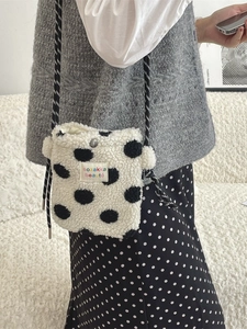 Dalmatian style plush heart shoulder bag with lamb wool and black polka dots