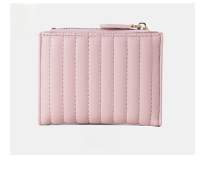 Detailed back view of pink short wallet with vertical quilted pattern and zip closure