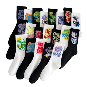 Cotton athletic mid-calf socks with colorful motivational slogans in black and white