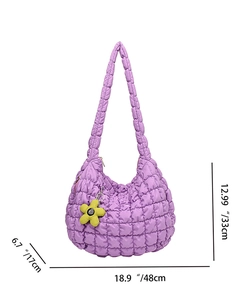 Detailed view of purple quilted tote with flower charm and size dimensions 48x33x17cm
