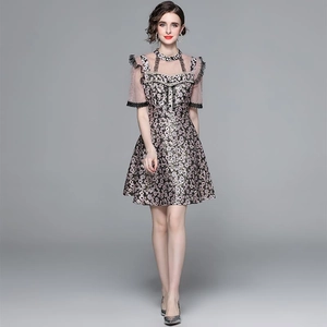 Slim fit floral dress with mesh neckline, beadwork, and lace details in dark floral print