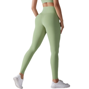 Light green high-waisted seamless yoga pants with butt-lifting design for fitness training