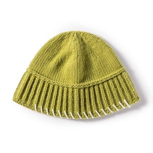 Lime green ribbed knit beanie with decorative white stitching on a plain white background