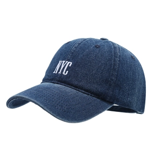 Classic navy denim baseball cap featuring white NYC embroidery and distressed brim detail