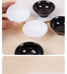 Detailed view of mini 6.5cm Japanese ramen bowl model held by hand for scale reference