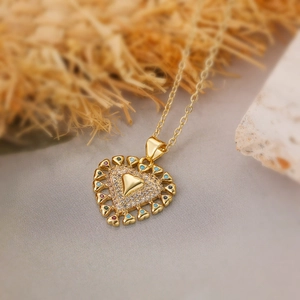 Gold heart pendant necklace with colorful enamel and white cubic zirconia accents
