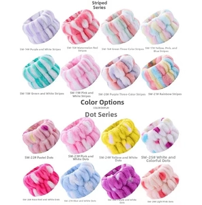 Macro detail of plush absorbent spa wristbands in various stripe and dot patterns