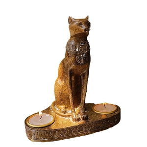 Egyptian Bastet cat goddess double candle holder with antique bronze finish on white background