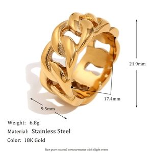 Macro shot of gold chain ring with precise dimensions and detailed steel craftsmanship
