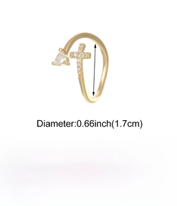 Detail of copper double cross ring with crystal triangle and pavé setting design