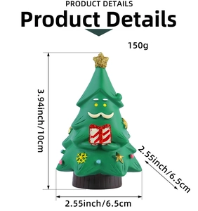 Detail of resin Christmas tree figurine with a white beard holding a striped gift box