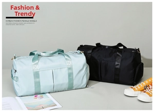 Detail view of water-resistant nylon sports gym bags in light blue and black colors