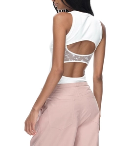 Detail of white lace stitching and back cutout on the ribbed racerback tank top