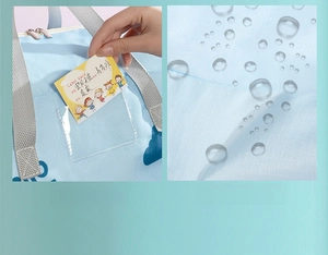 Waterproof fabric detail and clear name label slot on the blue kindergarten storage bag
