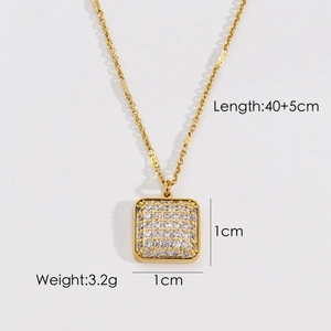 Macro shot of 1cm square crystal pendant on 40+5cm gold stainless steel chain