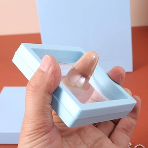 Close-up showing high elasticity and tear resistance of the light blue PE film jewelry box