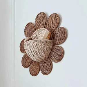 Handwoven sunflower rattan wall basket with a storage pocket in Nordic style