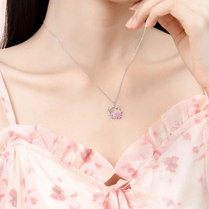 S925 silver necklace with pink petals and zircon butterfly pendant on model