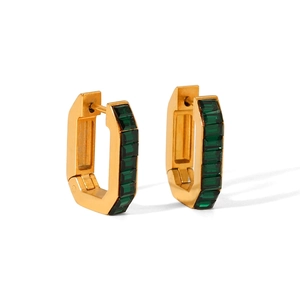 Detail view of U-shaped gold earrings with green rectangle zircons showing 1.7cm dimensions