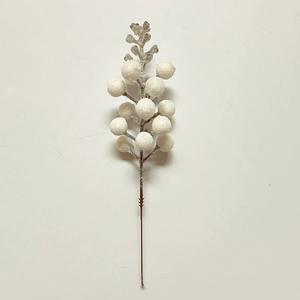 Close-up of white frosted artificial berry branch for Christmas tree DIY decor