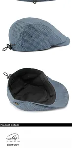 Detail view of light grey seersucker newsboy cap with adjustable toggle and soft inner lining