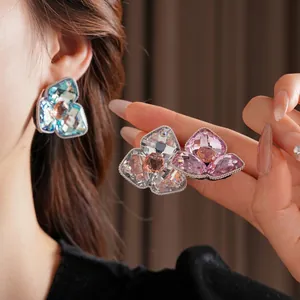 Luxury rhinestone flower stud earrings in blue, silver, and pink crystal options