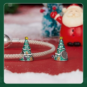 Detailed macro view of S925 sterling silver Christmas tree charms with green enamel