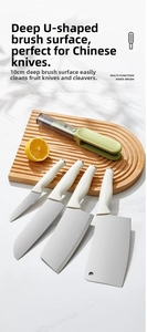 Macro detail of U-shaped blade cleaning brush on wooden board with stainless steel knives
