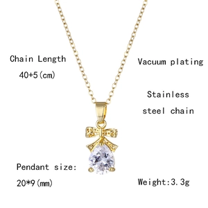 Detail showing gold teardrop pendant with bow knot and technical product specifications