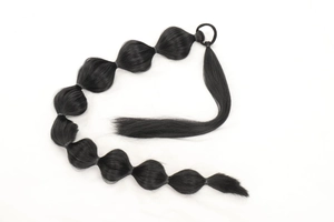 Detailed view of 75cm long black bubble ponytail extension with secure elastic wrap