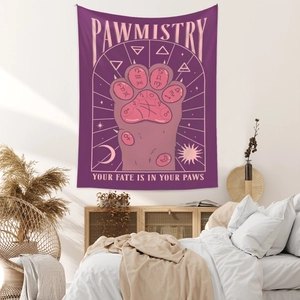 Detail of bohemian purple cat pawmistry tapestry with mystical astrology symbols