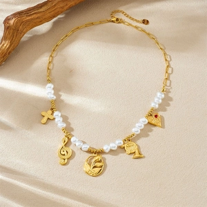 Gold plated stainless steel beaded necklace with pearls and music note pendants